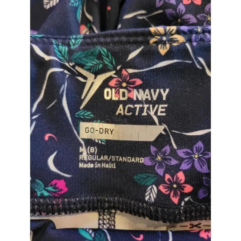 Old Navy Go Dry medium (8) navy with pink & purple floral leggings